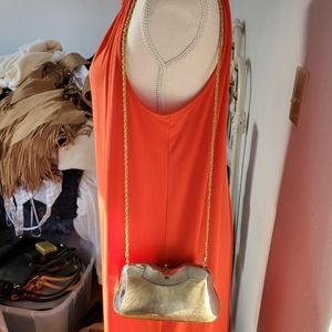 Silverplated and goldplated clutch purse